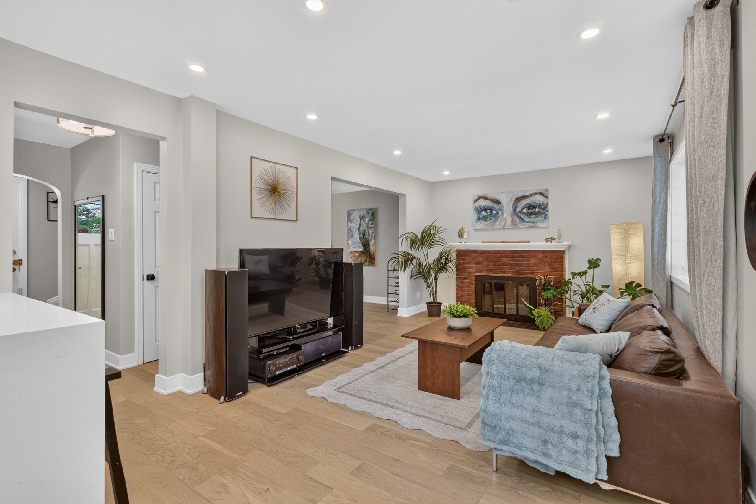 Living room with wood-burning fireplace