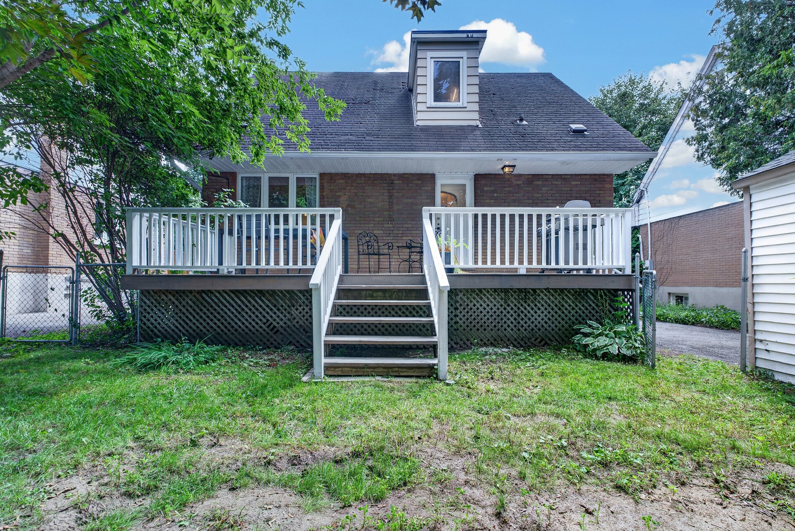 Rear elevation and fenced yard at 337 Joffre-Belanger Way